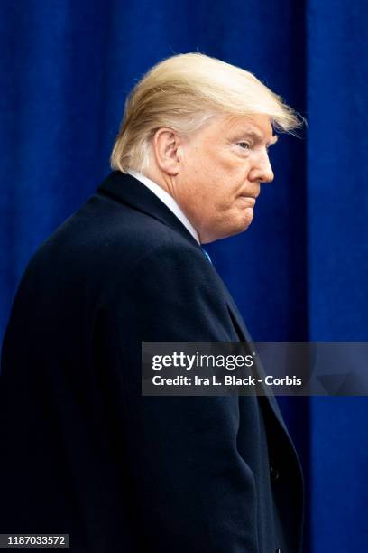 Profile of the 45th President Donald J. Trump leaves the stage with the bulletproof glass showing after the opening ceremony of the 100th annual...
