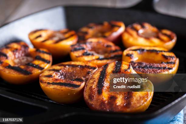 grilled peaches - grilled stock pictures, royalty-free photos & images