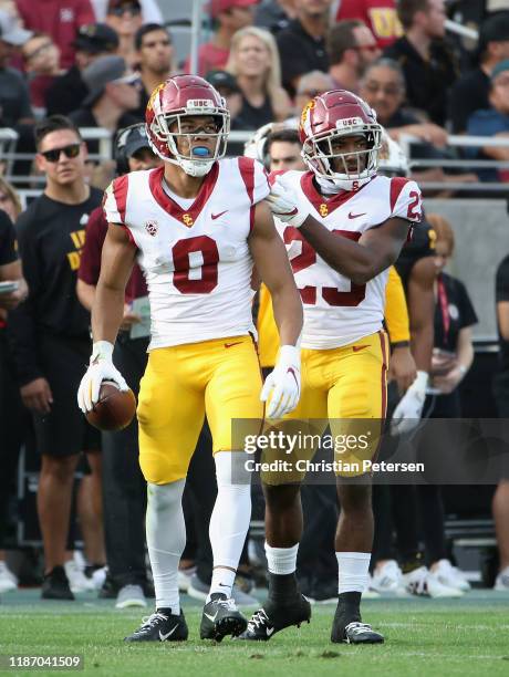 Wide receiver Amon-Ra St. Brown and running back Kenan Christon of the USC Trojans during the NCAAF game against the Arizona State Sun Devils at Sun...
