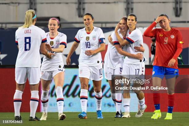 Morgan Brian of the U.S. Woman"u2019s national soccer team celebrates with Tobin Heath of U.S. After scoring during the first half against the Costa...