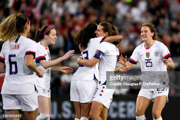 Christen Press of the U.S. Woman's national soccer team and Tobin Heath react after a goal during the second half against the Costa Rica woman's...