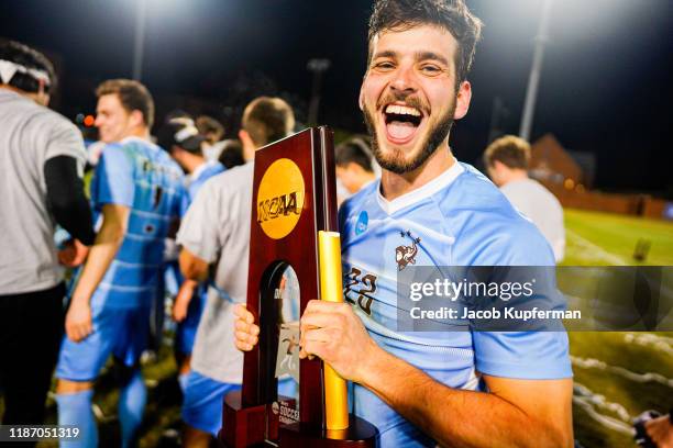 Tufts Jumbos players celebrate after their win during the Division III Men's Soccer Championship held at UNCG Soccer Stadium on December 7, 2019 in...