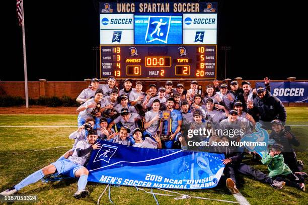 Tufts Jumbos players celebrate after their win during the Division III Men's Soccer Championship held at UNCG Soccer Stadium on December 7, 2019 in...