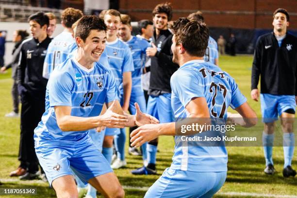 Tufts Jumbos players react after their win during the Division III Men's Soccer Championship held at UNCG Soccer Stadium on December 7, 2019 in...