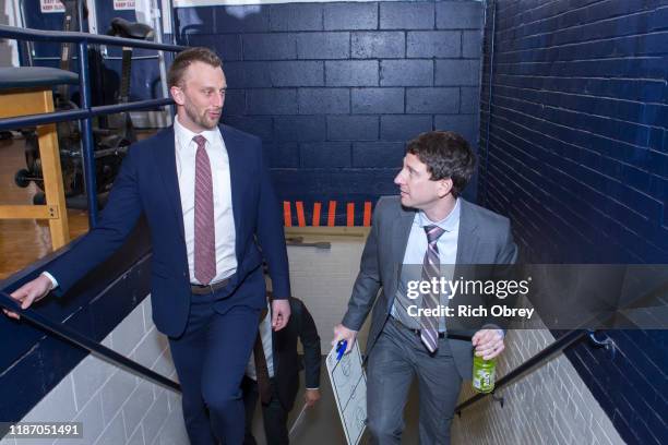 Darren Erman, Head Coach of the Maine Red Claws , and Head Coach Connor Johnson of the Delaware Blue Coats walk up to the game on Saturday, December...