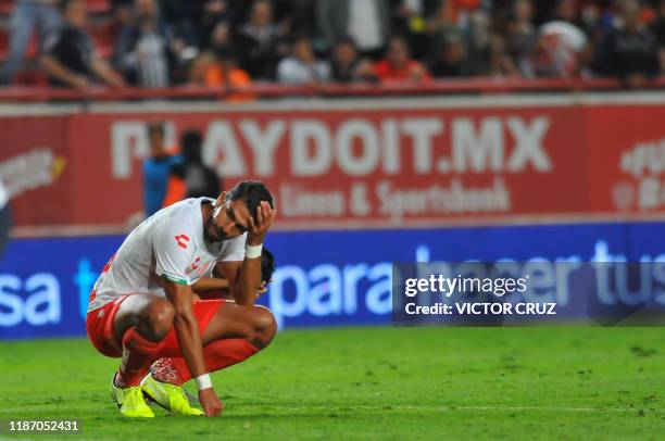 Eduardo Herrera of Necaxa reacts after the match against Monterrey during their semifinal, second leg, Mexican Apertura 2019 tournament football...