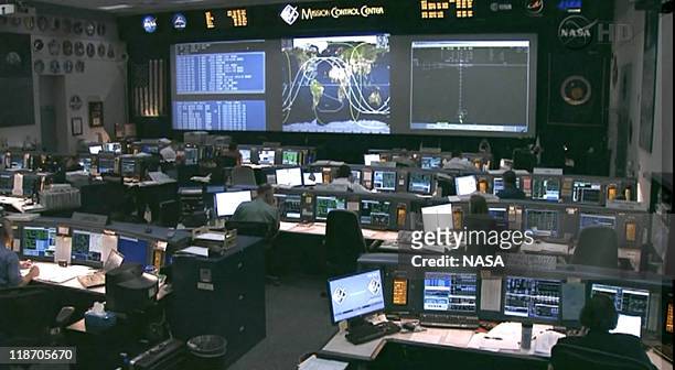 In this video screen grab provided by the National Aeronautics and Space Administration , Mission Control Center at Johnson Space Center directs NASA...