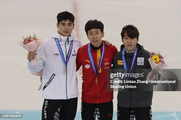 Silver medalist Liu Shaoang of Hungary, gold medalist Han Tianyu of China and bronze medalist Park Ji Won of Korea pose during the medal ceremony for...