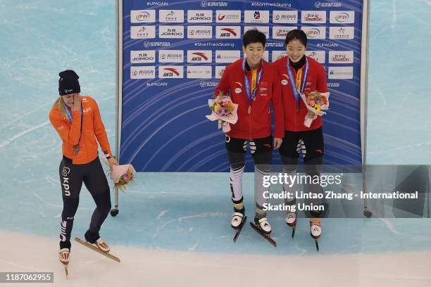 Silver medalist Yara van Kerkhof of Netherlands, gold medalist Fan Kexin of China and bronze medalist Qu Chunyu of China pose during the medal...