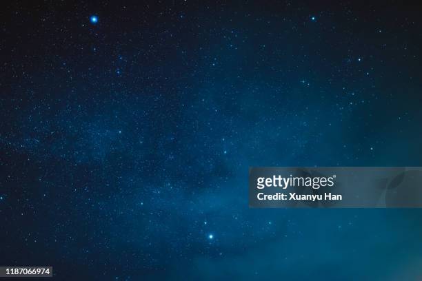 blue starry sky - night stock pictures, royalty-free photos & images