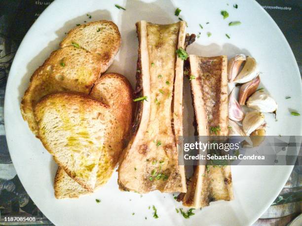 roasted bone marrow on food restaurant. - bone marrow stock pictures, royalty-free photos & images