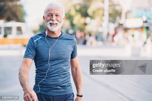 healthy lifestyle - active senior man stock pictures, royalty-free photos & images