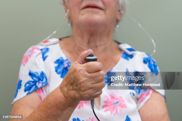 Woman takes a hearing test in a sound booth on July 30, 2019 in Cardiff, United Kingdom.