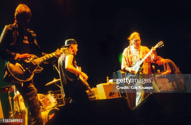 Neil Young and Pearl Jam perform on stage at Pukkelpop Festival, Hasselt, Belgium, 25th August 1995. L-R Mike McCready, Jeff Ament, Neil Young, Stone...