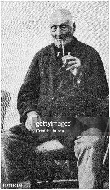antique photo: 100 years old man smoking pipe - senior memory stock illustrations