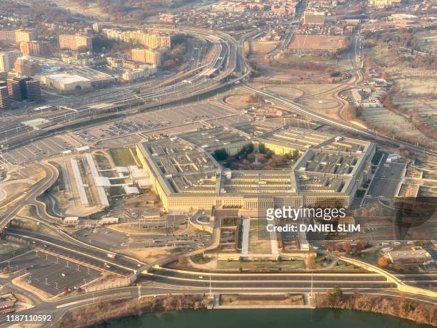 The Pentagon, the headquarters of the US Department of Defense, located in Arlington County, across the Potomac River from Washington, DC is seen...