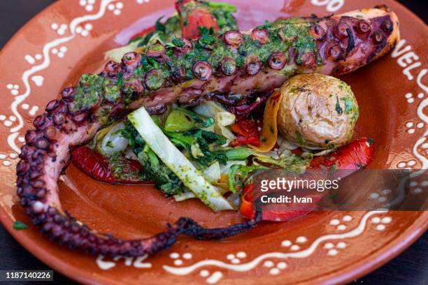 portugal style food, fine dining, grilled octopus on a plate - portugiesische kultur stock-fotos und bilder
