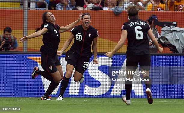 Shannon Boxx of USA celebrate their team opening goal during the FIFA Women's World Cup 2011 Quarter Final match between Brazil and USA at...