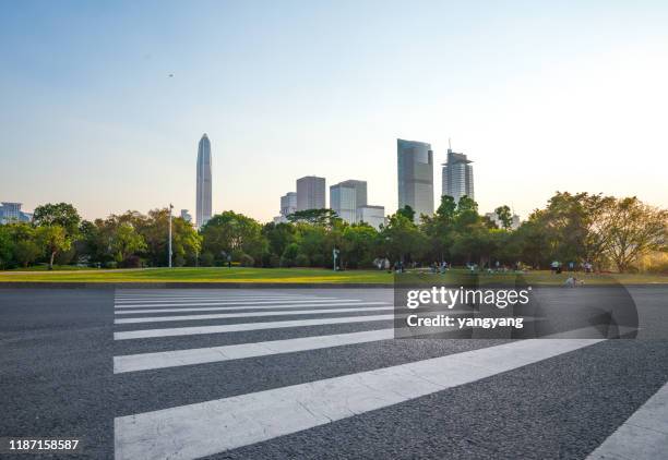 city roads and modern office buildings in shenzhen, china - 上り坂 ストックフォトと画像