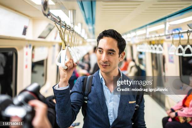 Guy Riding Train Train Handles Photos and Premium High Res Pictures - Getty Images