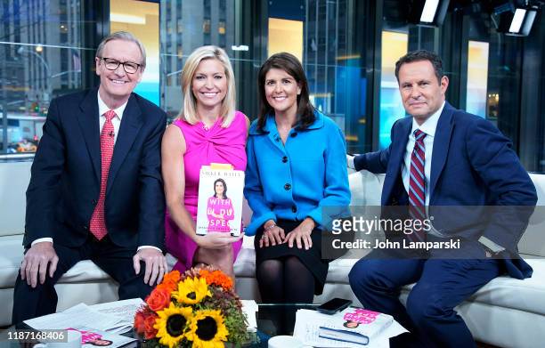 Fox anchors Steve Doocy, Ainsley Earhardt and Brian Kilmeade interview ormer UN Ambassador Nikki Haley visits "Fox & Friends" at Fox News Channel...