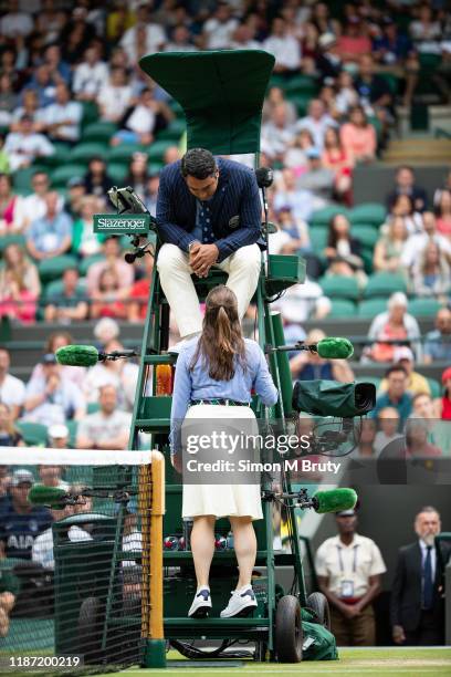 Line judge talks with the Umpire during the Men's Third Round between Joao Sousa of Portugal and Daniel Evans of United Kingdom at The Wimbledon Lawn...