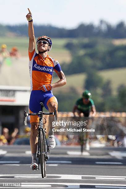 Luis-Leon Sanchez of Spain and Rabobank Cycling Team celebrates victory as he crosses the finish line during Stage 9 of the 2011 Tour de France from...