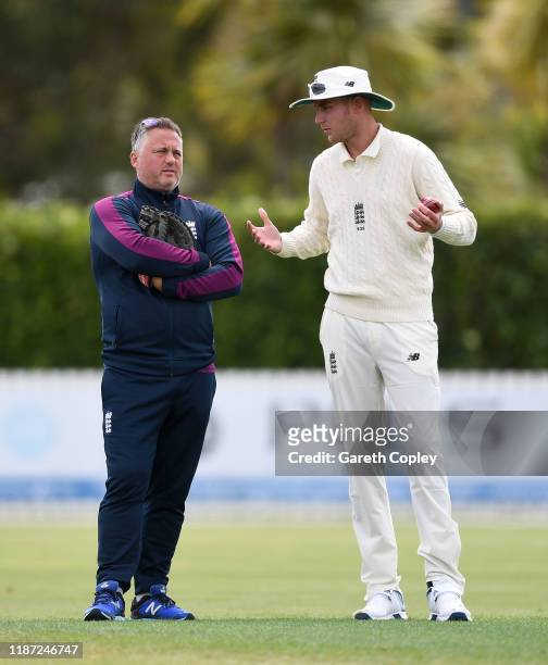 Stuart Broad of England speaks with coach Darren Gough during the tour match between New Zealand XI and England at Cobham Oval on November 13, 2019...