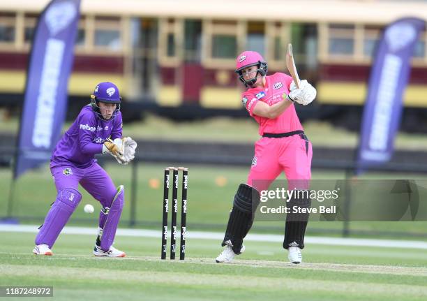 Ellyse Perry plays a shot during the Women's Big Bash League match between the Sydney Sixers and the Hobart Hurricanes at Invermay Park on November...