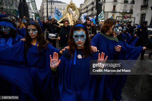 Extinction Rebellion' activists performing the 'March of the Dead Oceans', a protest to condemn the loss of marine biodiversity coinciding with the...