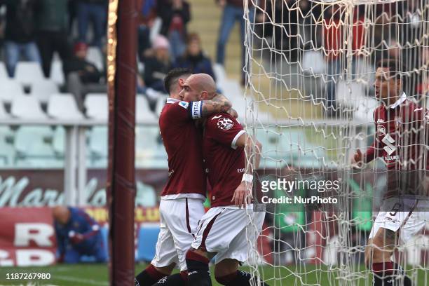 Simone Zaza of Torino FC celebrates with teammates after scoring during the Serie A football match between Torino FC and ACF Fiorentina at Olympic...
