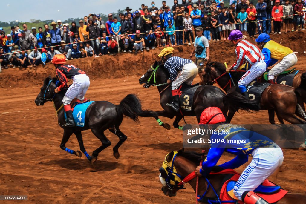 Jockeys competing during the traditional race.
A total of...