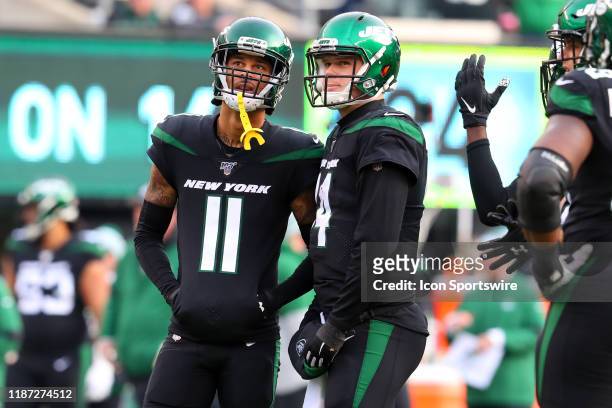 New York Jets wide receiver Robby Anderson and New York Jets quarterback Sam Darnold look at the video board during the National Football League game...