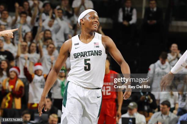 Cassius Winston of the Michigan State Spartans celebrates his basket in the second half against the Rutgers Scarlet Knights at the Breslin Center on...