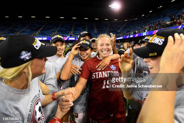Goalie Katie Meyer of the Stanford Cardinal celebrates with her teammates after defeating the North Carolina Tar Heels during the Division I Women's...