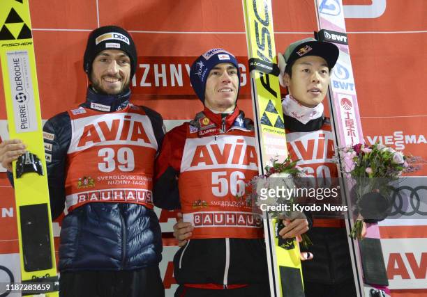 Stefan Kraft of Austria poses at the ceremony after winning the men's large hill individual competition at Ski Jumping World Cup in Nizhny Tagil,...