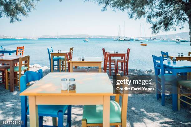 greek tavern in greek island,greece - griekenland stockfoto's en -beelden