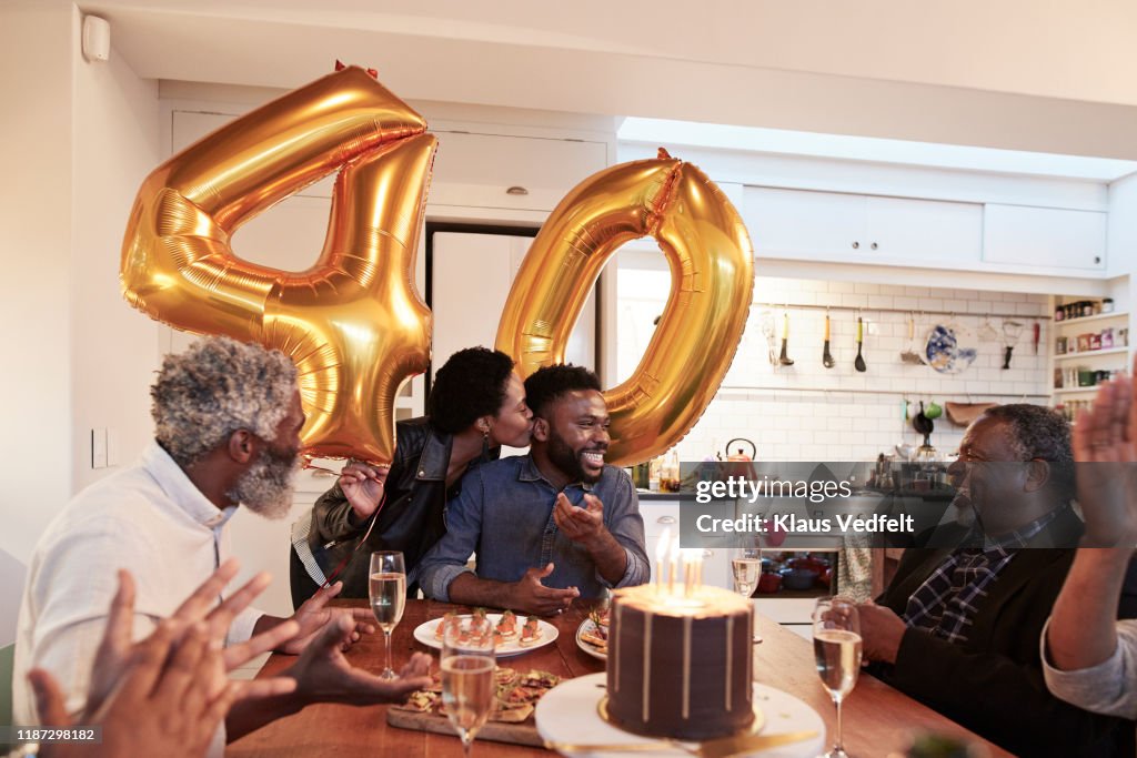 Happy family enjoying birthday celebration