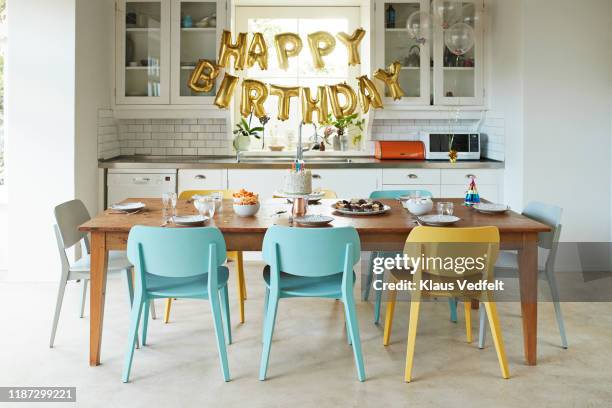 furniture in kitchen during birthday party - birthday party stockfoto's en -beelden