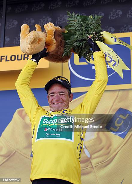 Thomas Voeckler of France and Team Europcar claims the yellow jersey after finishing in second place during Stage 9 of the 2011 Tour de France from...