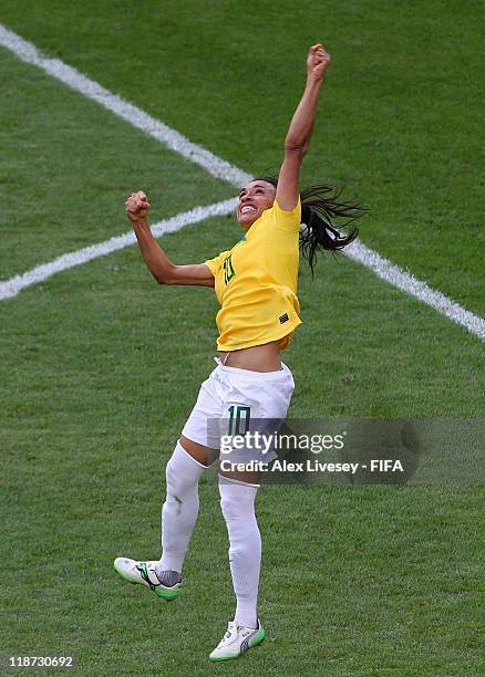 Marta of Brazil celebrates after scoring her second goal during the FIFA Women's World Cup Quarter Final match between Brazil and USA at...