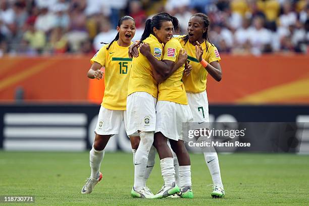 Marta of Brazil celebrates with her team mates after she scores her team's 2nd goal during the FIFA Women's World Cup 2011 Quarter Final match...