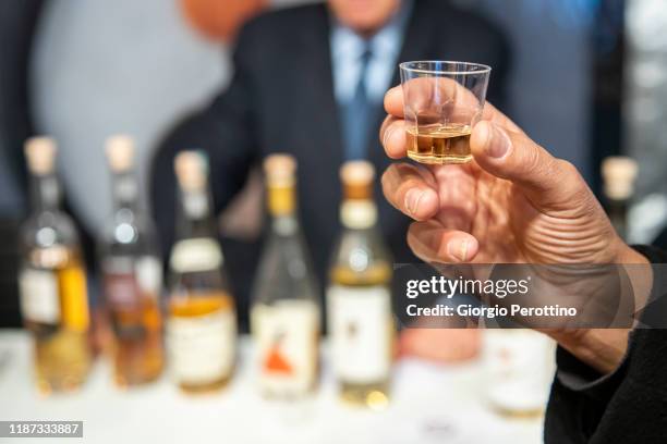 Guests attend a grappa tasting market during the International Alba White Truffle Fair November 09, 2019 in Alba, Italy.