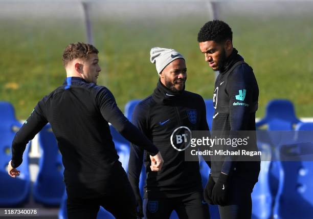 Joe Gomez and Raheem Sterling train during and England Media Access Day at St Georges Park on November 13, 2019 in Burton-upon-Trent, England.