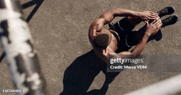 building strength is simply a part of his day - bodyweight training stock pictures, royalty-free photos & images
