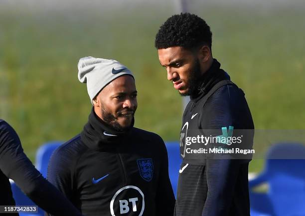 Joe Gomez and Raheem Sterling attend a training session during and England Media Access Day at St Georges Park on November 13, 2019 in...