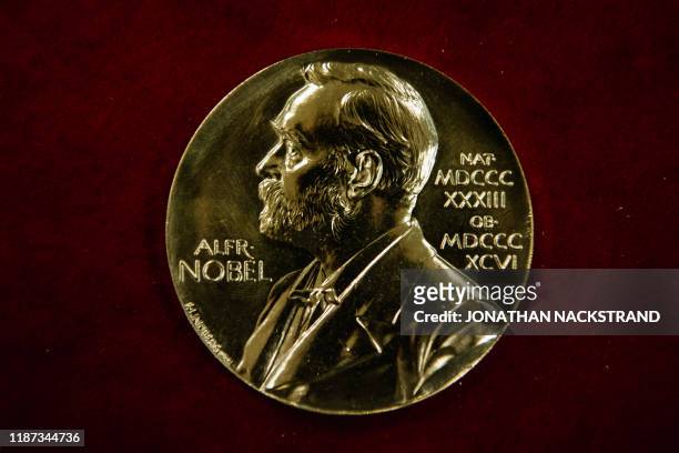 Nobel Prize medal is pictured during the production process on October 29, 2019 in Eskilstuna, Sweden. - The Nobel Prize awards ceremonies will take...