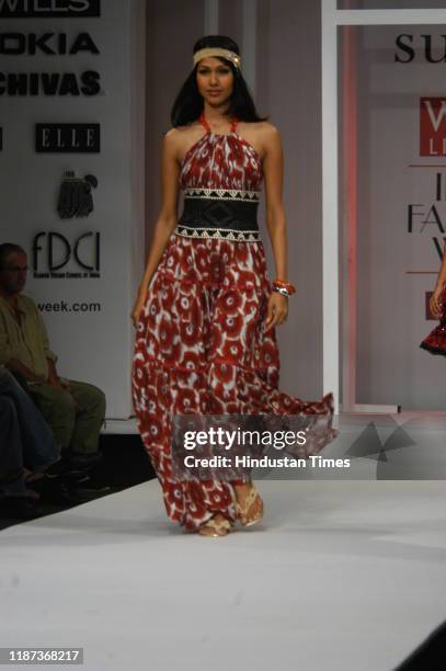 Model displays a creation by fashion designer Surily Goel during the Wills Lifestyle India Fashion Week at Pragati Maidan, on September 7, 2007 in...