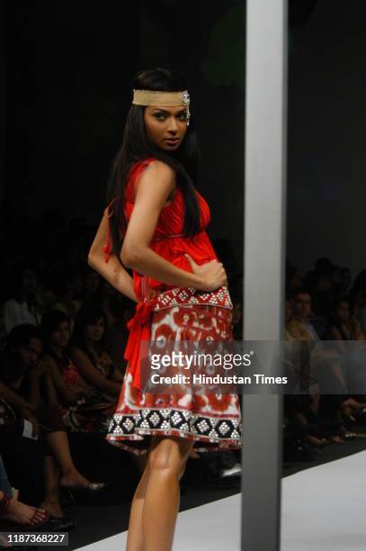 Model displays a creation by fashion designer Surily Goel during the Wills Lifestyle India Fashion Week at Pragati Maidan, on September 7, 2007 in...