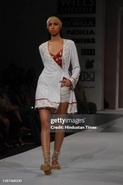 Model displays a creation by fashion designer Surily Goel during the Wills Lifestyle India Fashion Week at Pragati Maidan, on September 7, 2007 in...